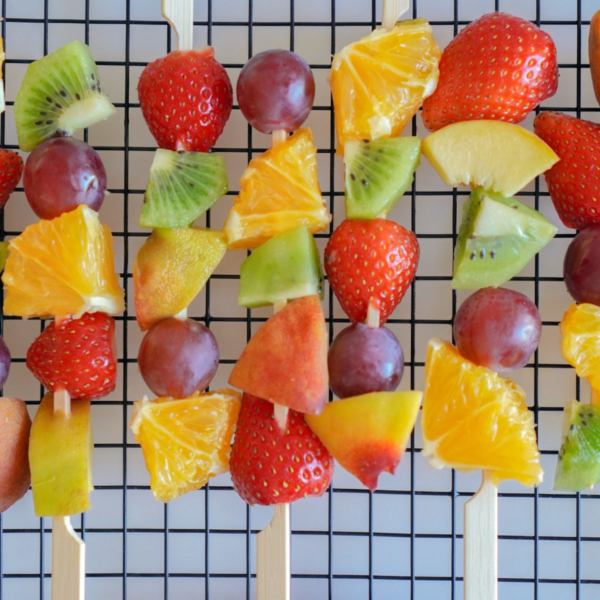 Bamboo paddle skewers in fruit