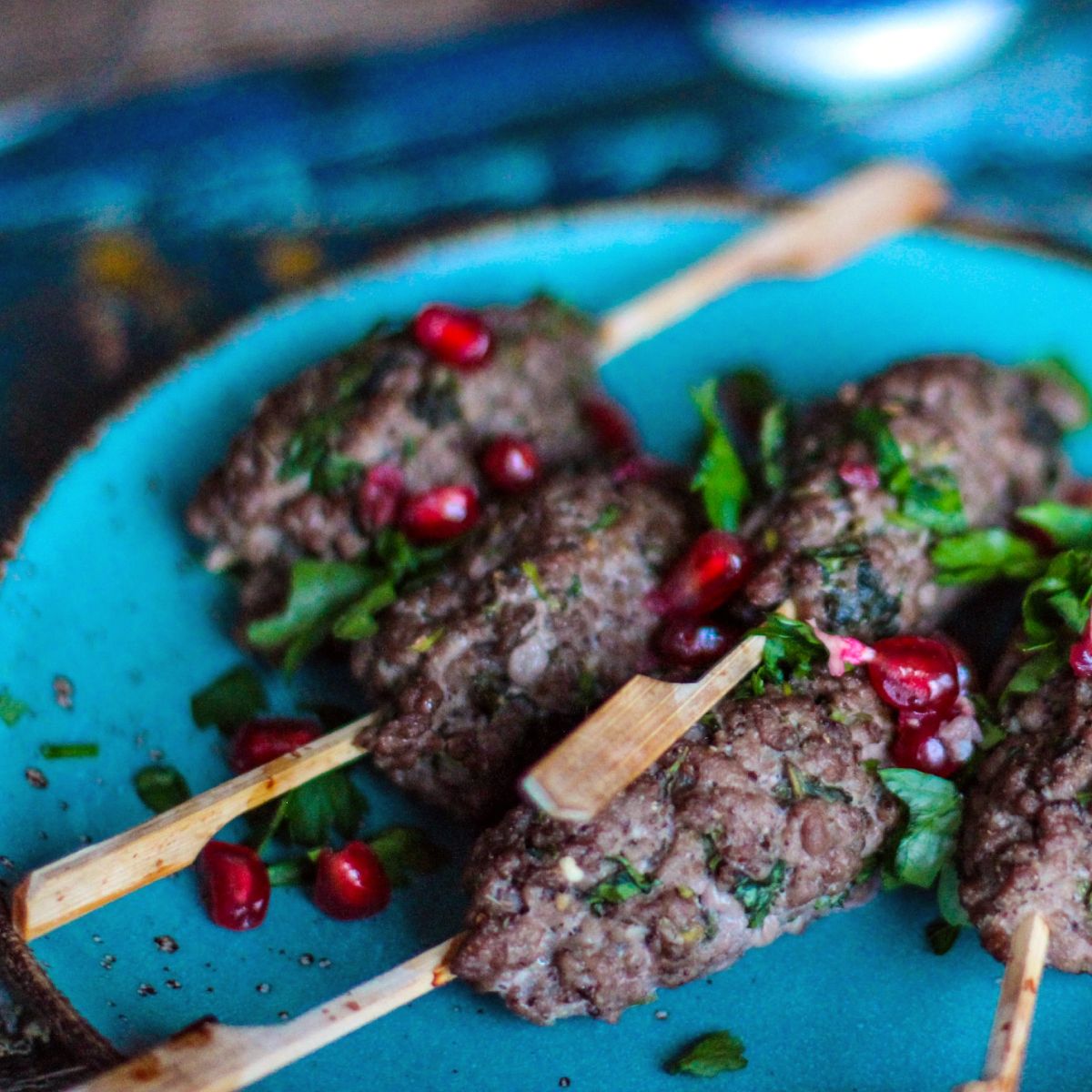 Bamboo paddle skewers in meat