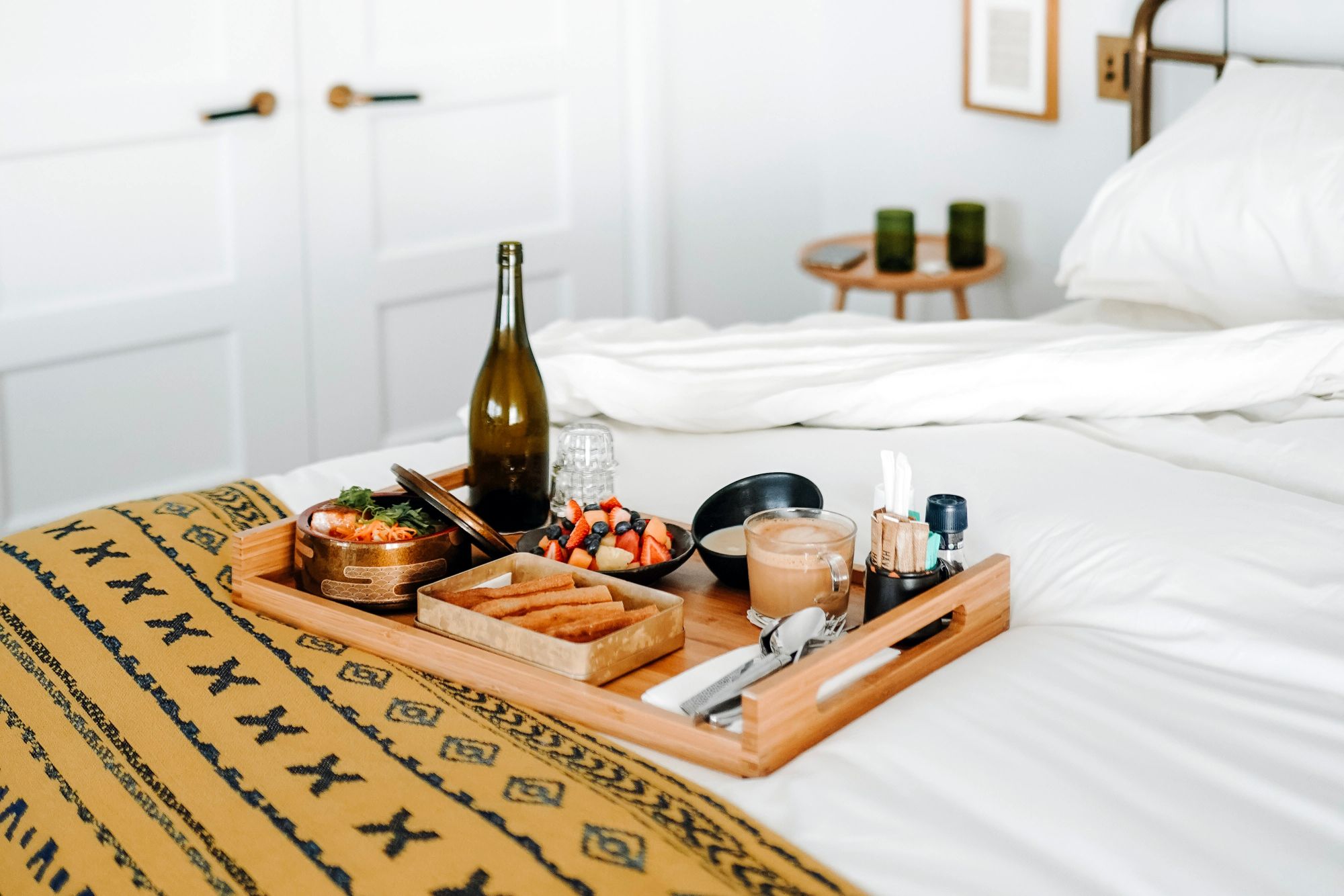 Breakfast in bed on bamboo serving tray